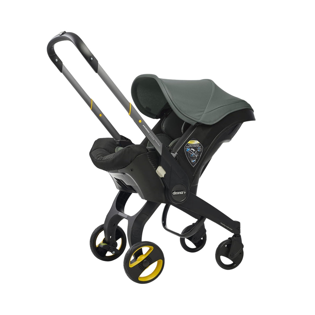 Doona all-in-one travel system with slate green car seat and stroller, compact and versatile for infant travel and convenience.