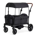 Evolur Trailblazer double stroller in black with all-terrain wheels, 5-point harness, removable canopy, and spacious storage for two kids.