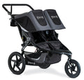 My Store BOB Gear Revolution Flex 3.0 Duallie jogging stroller in graphite black with adjustable handlebars and large wheels for outdoor running.