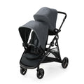 Graco Ready2Grow 2.0 double stroller with bench seat and standing platform, Rafa color, designed for versatile family outings.