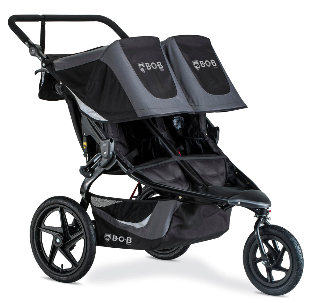 My Store BOB Gear Revolution Flex 3.0 Duallie jogging stroller in graphite black, showing the double stroller with adjustable handlebars.